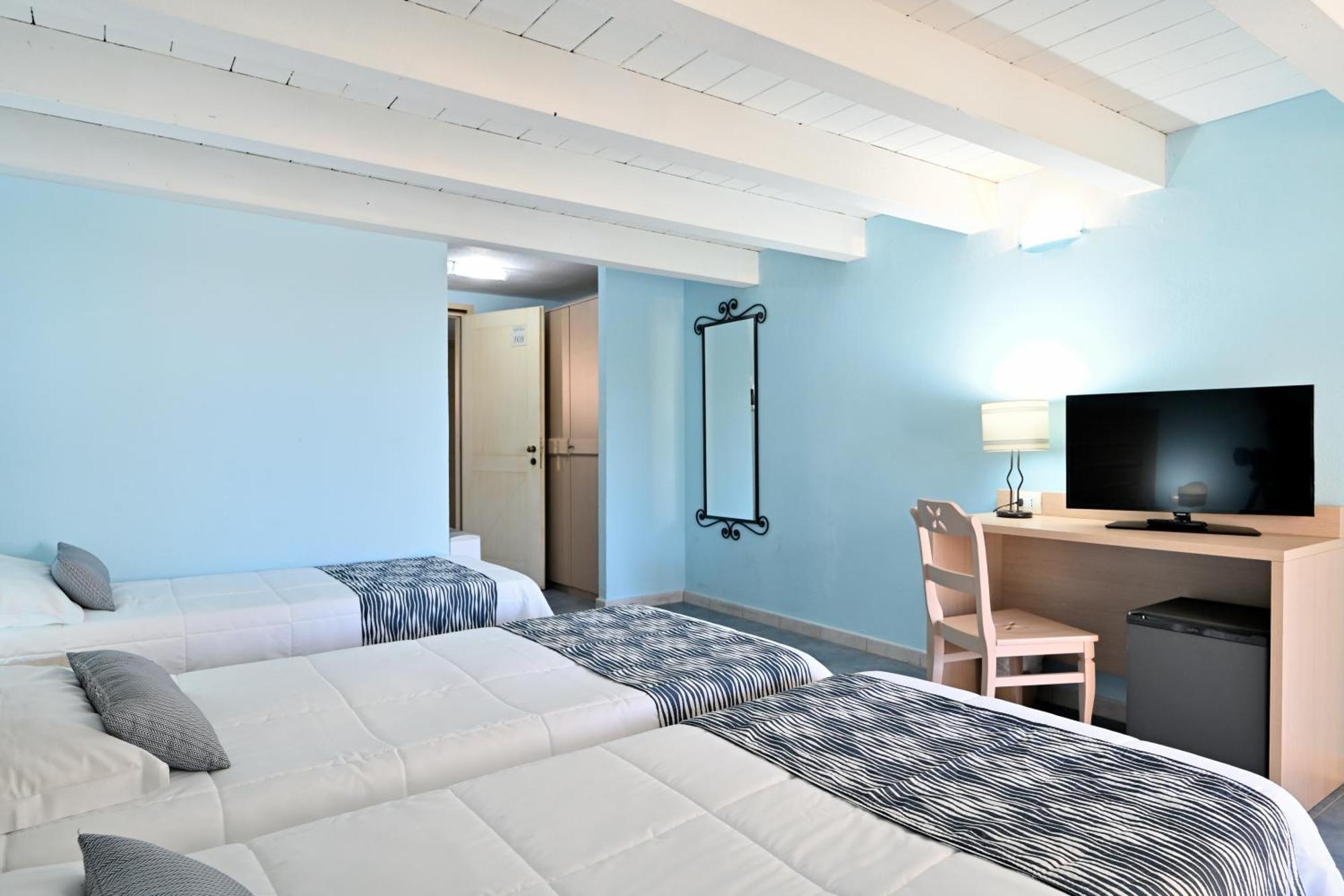 Cala Della Torre Resort La Caletta Extérieur photo