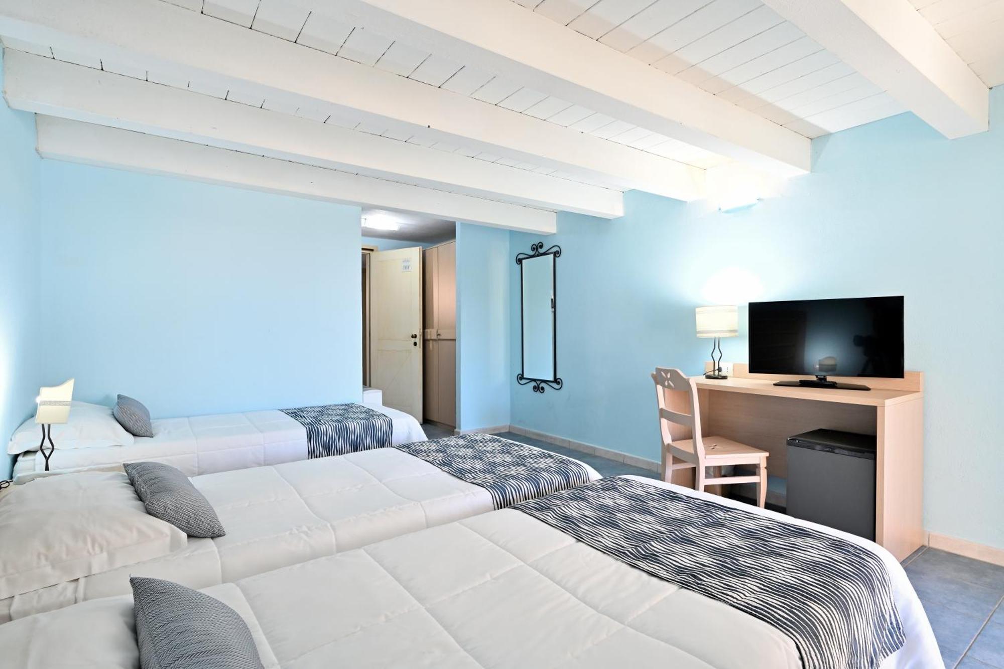 Cala Della Torre Resort La Caletta Extérieur photo