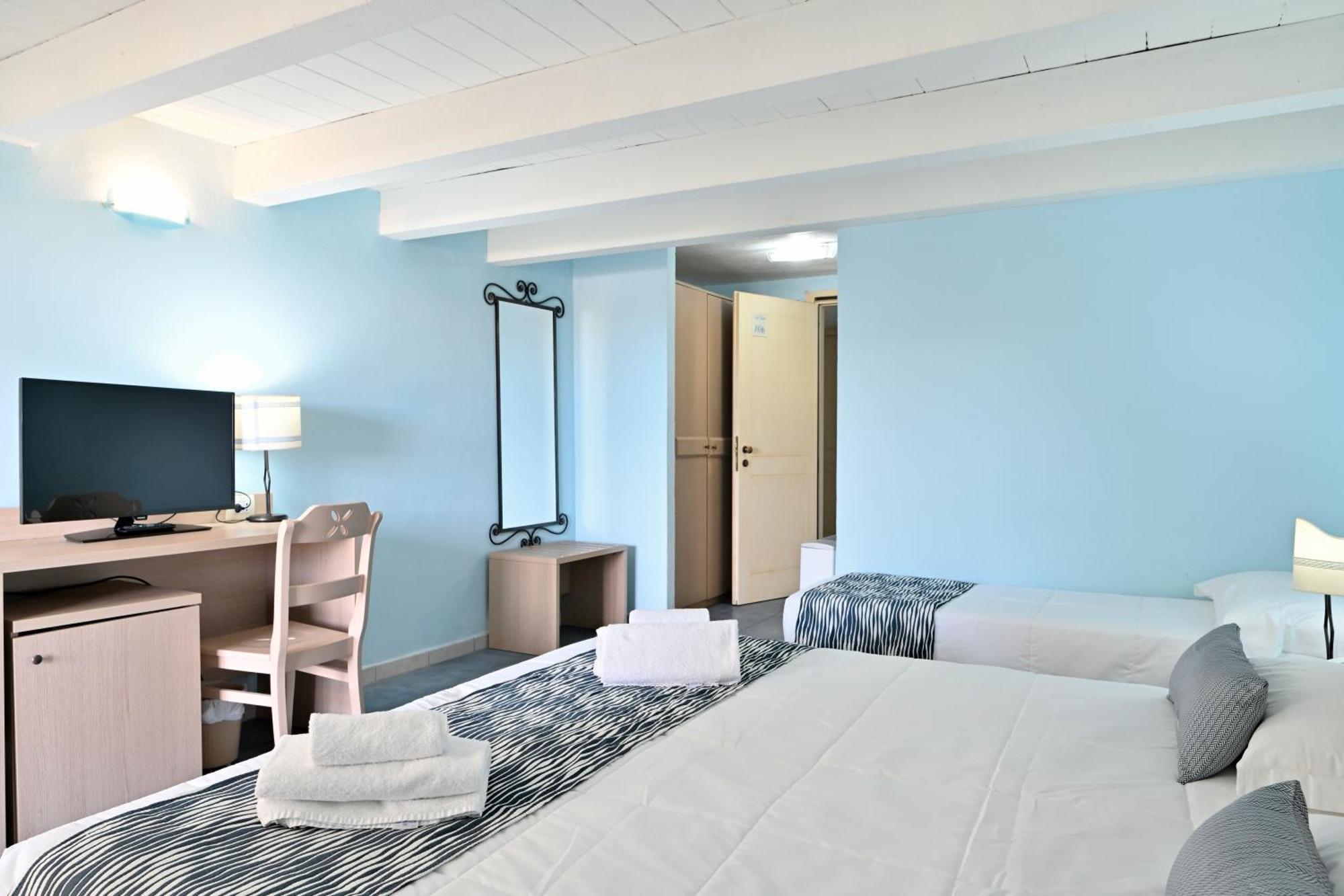 Cala Della Torre Resort La Caletta Extérieur photo