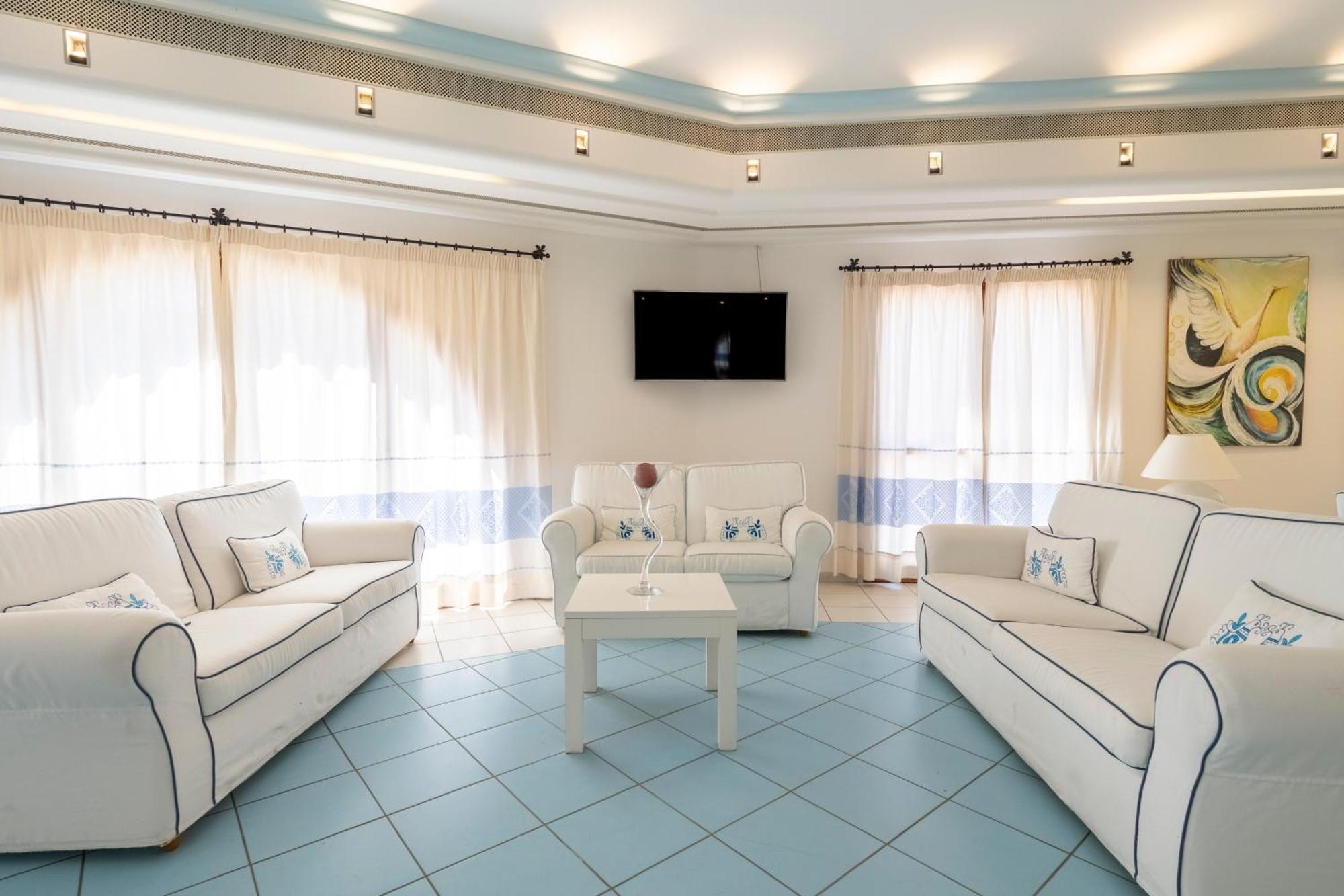 Cala Della Torre Resort La Caletta Extérieur photo