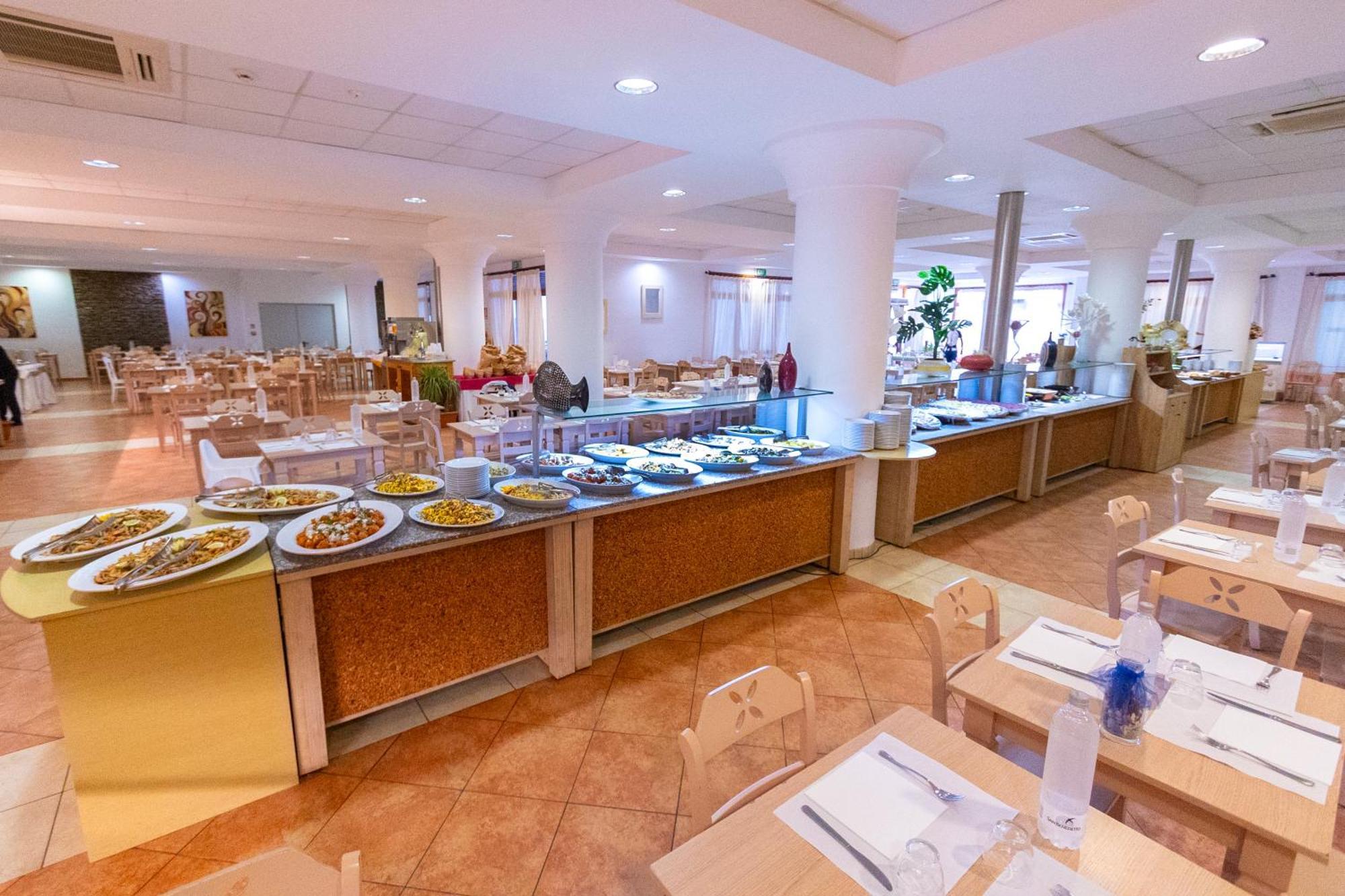 Cala Della Torre Resort La Caletta Extérieur photo